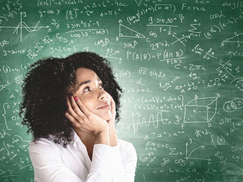 Young black woman thinking about mathematics problems