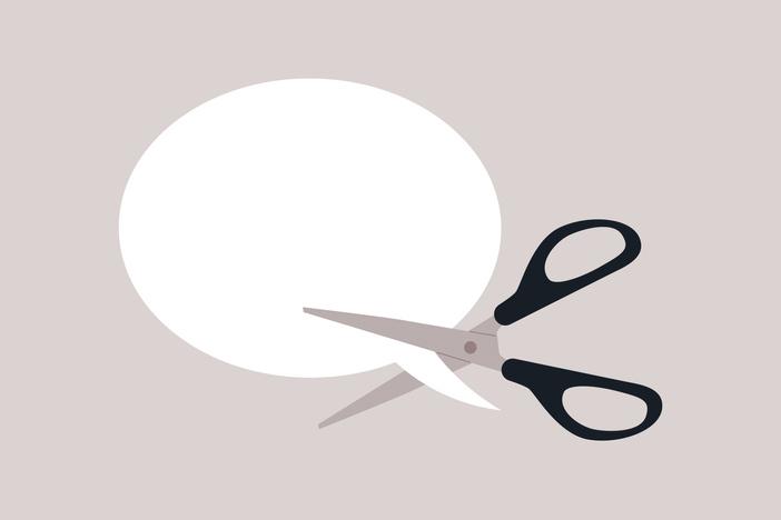 Scissors clipping speech bubble