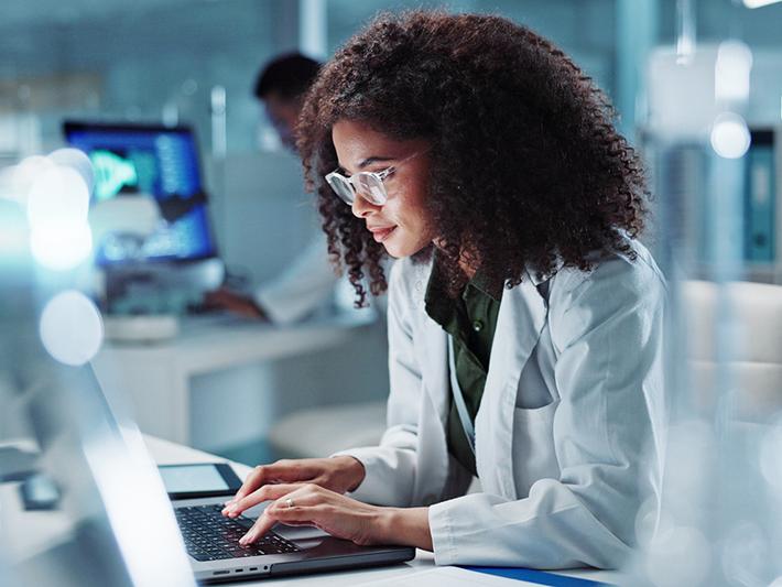 Black female scientist in a lab