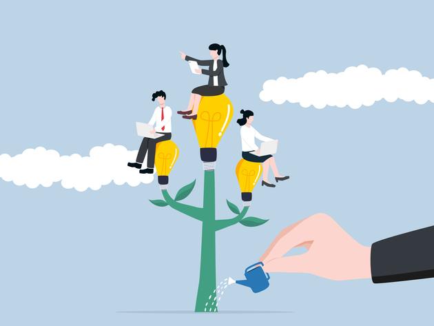 An illustration of business people sat on a growing plant