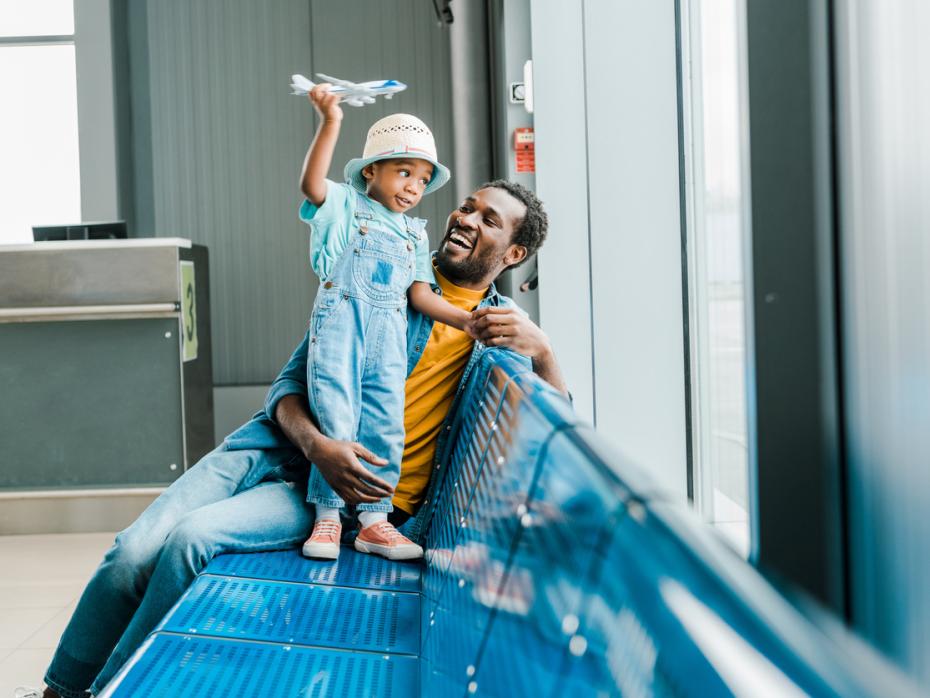 Father and son at an airport