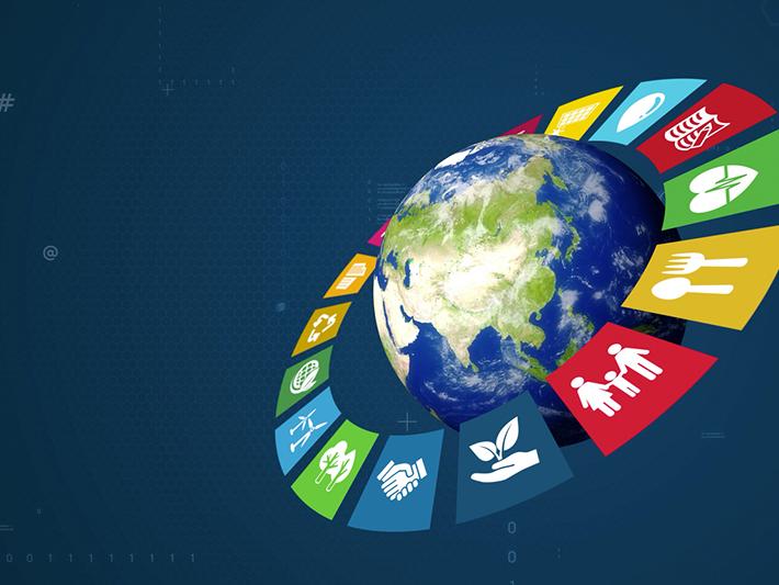 Globe surrounded by SDG icons