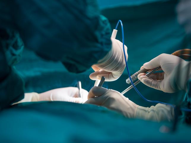 A surgery takes place in an operating theatre