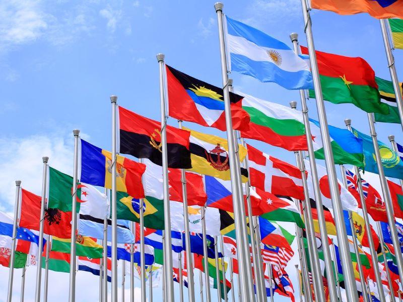 Image representing global politics with dozens of national flags