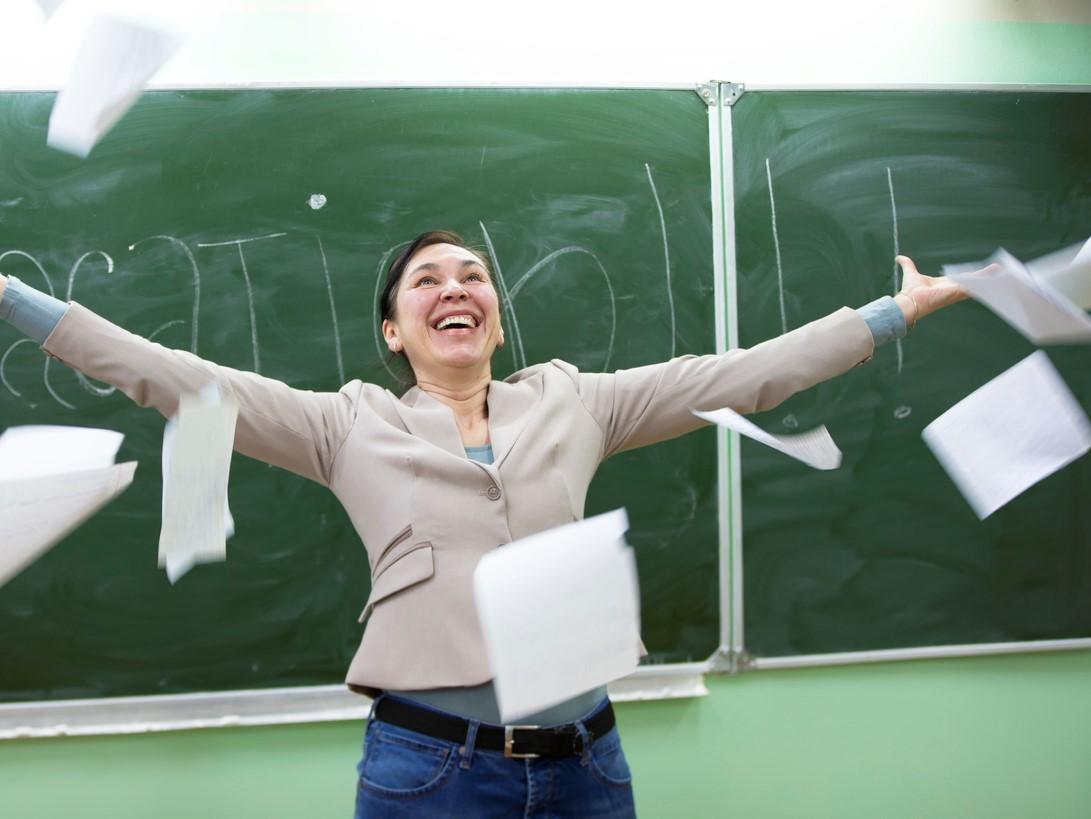Image of a new teacher celebrating the end of term