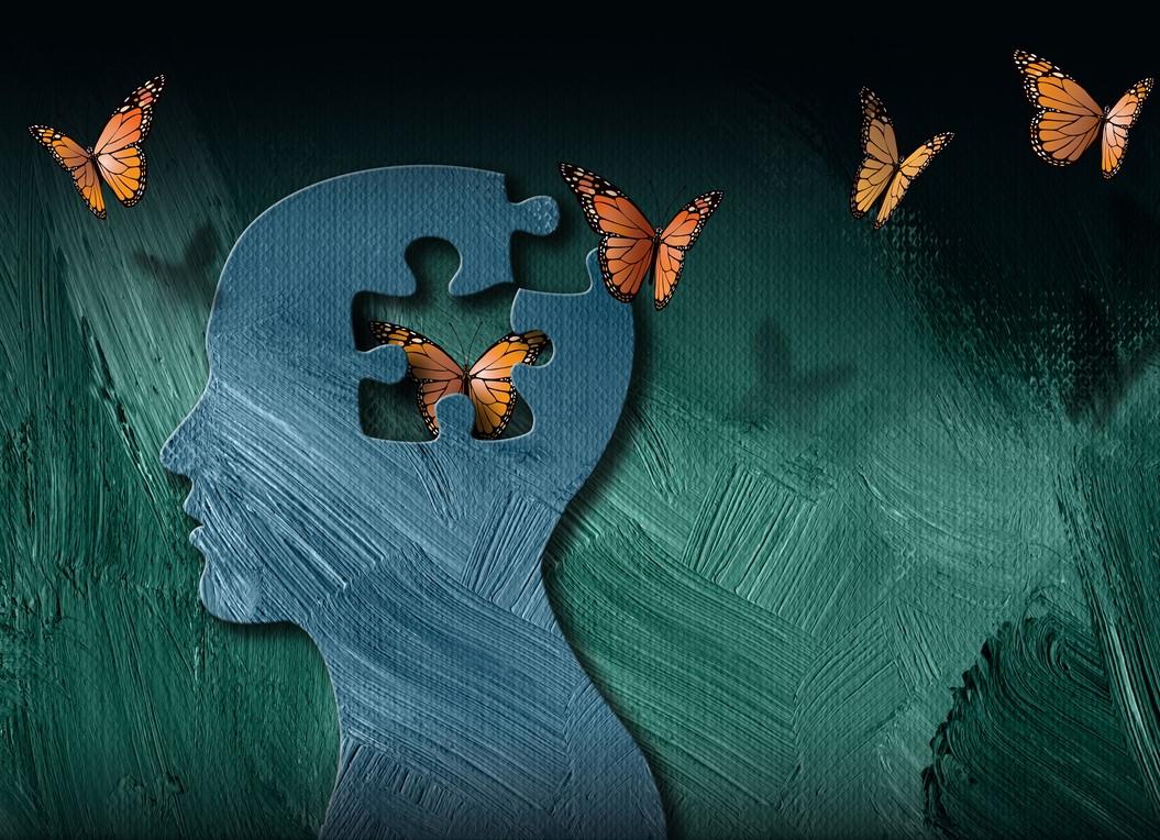 Abstract image representing free thoughts flying from a head in the form of butterflies