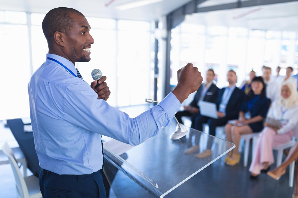Professional giving a talk at an event