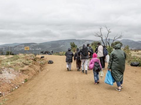 Image of refugees walking on their way to Europe