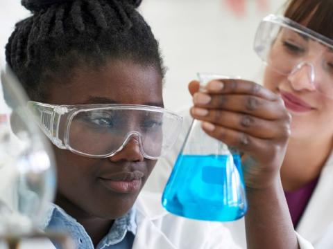 Image of a young black woman scientist
