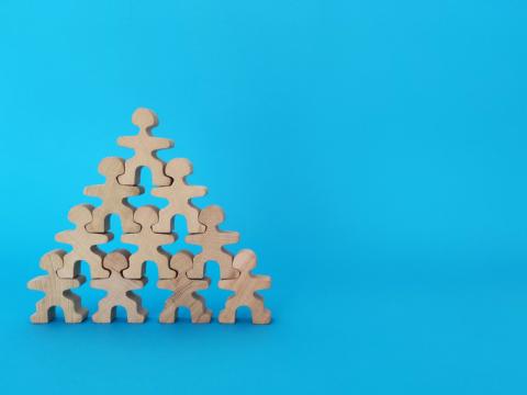 Pyramid of people-shaped blocks