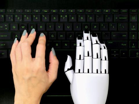 Image showing a human and AI writing together
