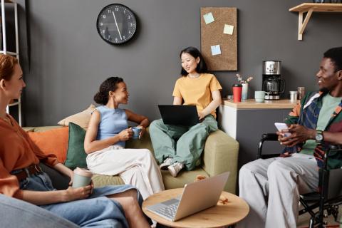 Members of Gen Z work in an office lounge