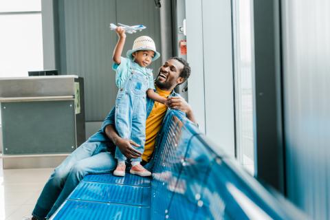 Father and son at an airport