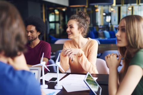 Business students chatting in a classroom