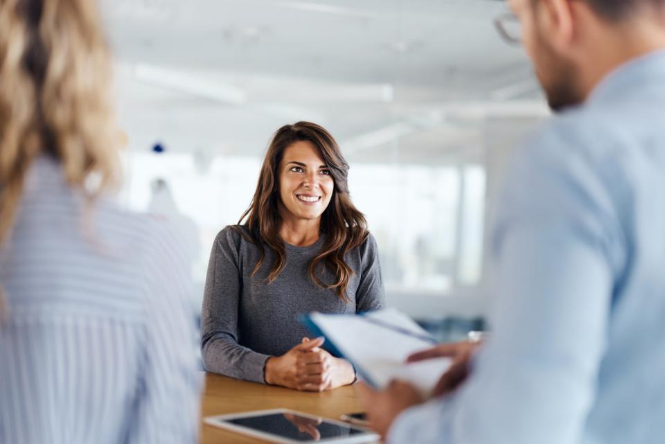 A woman interviews for a new job at a university