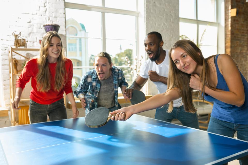 Students playing table tennis