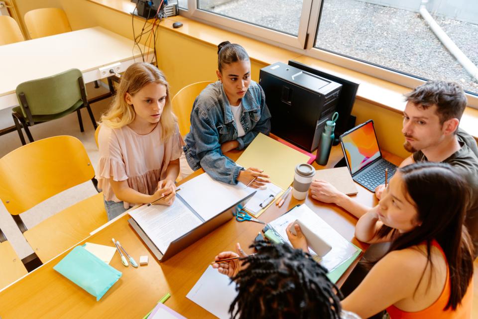 Students debating something in class